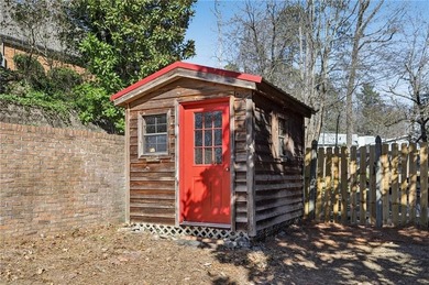 Tucked away on a quiet circle in Atlanta Country Clubs back nine on Atlanta Country Club in Georgia - for sale on GolfHomes.com, golf home, golf lot