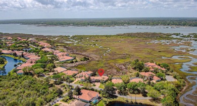 Discover The Perfect Blend Of Luxury  Comfort In This Stunning on Marsh Creek Country Club in Florida - for sale on GolfHomes.com, golf home, golf lot