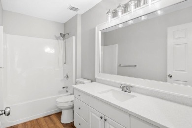 This must-see all brick home is nestled in the sought-after on Fairway Oaks at Magnolia Golf Course in Florida - for sale on GolfHomes.com, golf home, golf lot