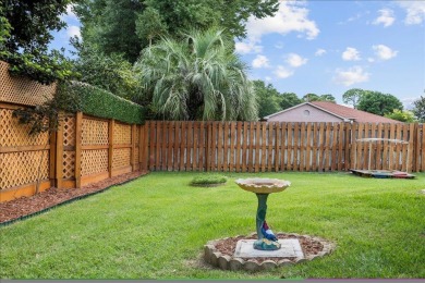 This must-see all brick home is nestled in the sought-after on Fairway Oaks at Magnolia Golf Course in Florida - for sale on GolfHomes.com, golf home, golf lot