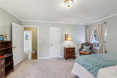 Tucked away on a quiet circle in Atlanta Country Clubs back nine on Atlanta Country Club in Georgia - for sale on GolfHomes.com, golf home, golf lot