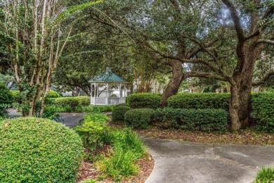 This must-see all brick home is nestled in the sought-after on Fairway Oaks at Magnolia Golf Course in Florida - for sale on GolfHomes.com, golf home, golf lot