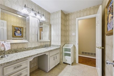 Tucked away on a quiet circle in Atlanta Country Clubs back nine on Atlanta Country Club in Georgia - for sale on GolfHomes.com, golf home, golf lot