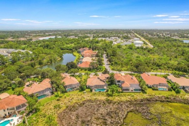 Discover The Perfect Blend Of Luxury  Comfort In This Stunning on Marsh Creek Country Club in Florida - for sale on GolfHomes.com, golf home, golf lot