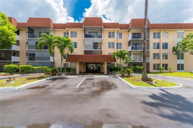 You're invited to this 2/2 corner unit with large windows on Inverrary Country Club in Florida - for sale on GolfHomes.com, golf home, golf lot
