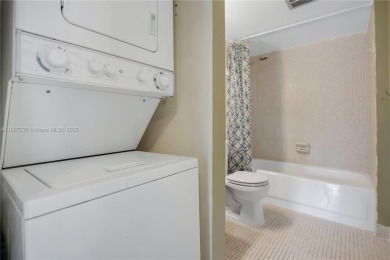 You're invited to this 2/2 corner unit with large windows on Inverrary Country Club in Florida - for sale on GolfHomes.com, golf home, golf lot