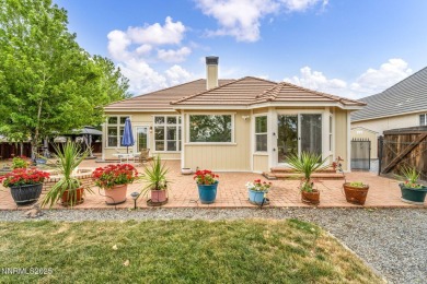 Stunning two-story home situated on the 15th green at Dayton on Dayton Valley Golf Club At Legado in Nevada - for sale on GolfHomes.com, golf home, golf lot