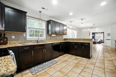 Welcome to your dream home on the north side of Elizabeth City! on The Pines At Elizabeth City in North Carolina - for sale on GolfHomes.com, golf home, golf lot