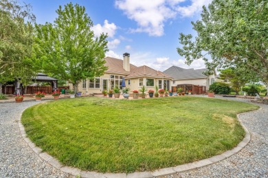 Stunning two-story home situated on the 15th green at Dayton on Dayton Valley Golf Club At Legado in Nevada - for sale on GolfHomes.com, golf home, golf lot
