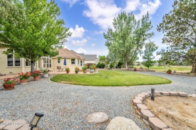 Stunning two-story home situated on the 15th green at Dayton on Dayton Valley Golf Club At Legado in Nevada - for sale on GolfHomes.com, golf home, golf lot
