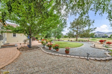 Stunning two-story home situated on the 15th green at Dayton on Dayton Valley Golf Club At Legado in Nevada - for sale on GolfHomes.com, golf home, golf lot