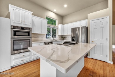 Stunning two-story home situated on the 15th green at Dayton on Dayton Valley Golf Club At Legado in Nevada - for sale on GolfHomes.com, golf home, golf lot