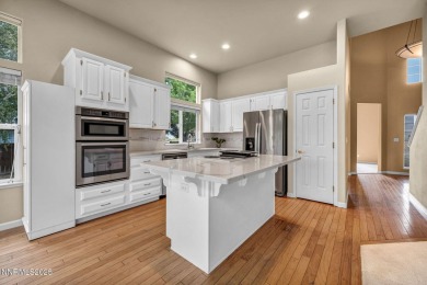 Stunning two-story home situated on the 15th green at Dayton on Dayton Valley Golf Club At Legado in Nevada - for sale on GolfHomes.com, golf home, golf lot