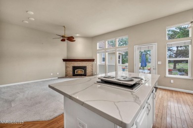 Stunning two-story home situated on the 15th green at Dayton on Dayton Valley Golf Club At Legado in Nevada - for sale on GolfHomes.com, golf home, golf lot