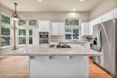 Stunning two-story home situated on the 15th green at Dayton on Dayton Valley Golf Club At Legado in Nevada - for sale on GolfHomes.com, golf home, golf lot
