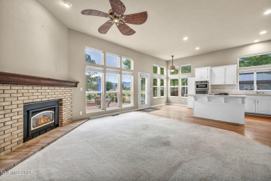 Stunning two-story home situated on the 15th green at Dayton on Dayton Valley Golf Club At Legado in Nevada - for sale on GolfHomes.com, golf home, golf lot