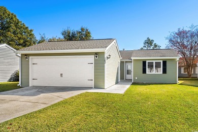 Beautifully updated 2-bedroom, 2-bath home in the desirable on Island Green Golf Club in South Carolina - for sale on GolfHomes.com, golf home, golf lot