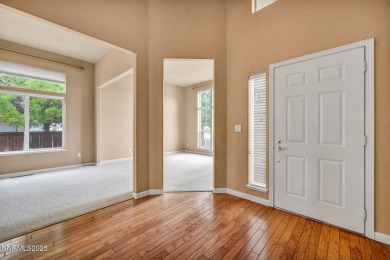Stunning two-story home situated on the 15th green at Dayton on Dayton Valley Golf Club At Legado in Nevada - for sale on GolfHomes.com, golf home, golf lot