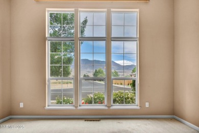 Stunning two-story home situated on the 15th green at Dayton on Dayton Valley Golf Club At Legado in Nevada - for sale on GolfHomes.com, golf home, golf lot