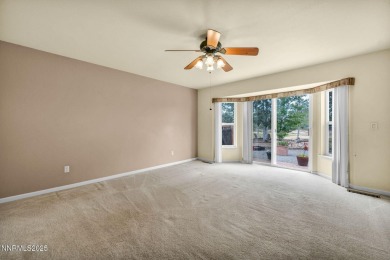 Stunning two-story home situated on the 15th green at Dayton on Dayton Valley Golf Club At Legado in Nevada - for sale on GolfHomes.com, golf home, golf lot