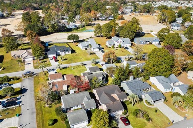 Beautifully updated 2-bedroom, 2-bath home in the desirable on Island Green Golf Club in South Carolina - for sale on GolfHomes.com, golf home, golf lot