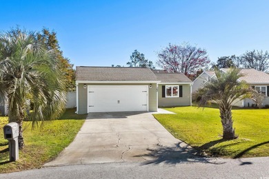 Beautifully updated 2-bedroom, 2-bath home in the desirable on Island Green Golf Club in South Carolina - for sale on GolfHomes.com, golf home, golf lot