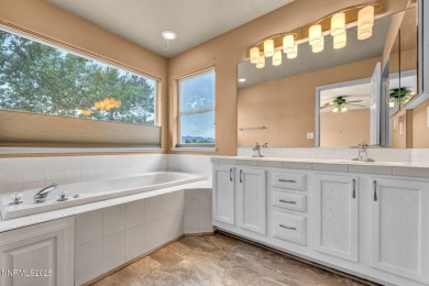 Stunning two-story home situated on the 15th green at Dayton on Dayton Valley Golf Club At Legado in Nevada - for sale on GolfHomes.com, golf home, golf lot