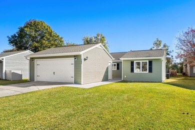 Beautifully updated 2-bedroom, 2-bath home in the desirable on Island Green Golf Club in South Carolina - for sale on GolfHomes.com, golf home, golf lot