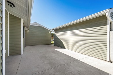 Beautifully updated 2-bedroom, 2-bath home in the desirable on Island Green Golf Club in South Carolina - for sale on GolfHomes.com, golf home, golf lot