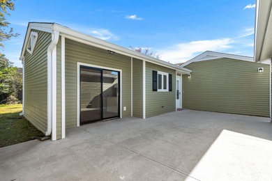 Beautifully updated 2-bedroom, 2-bath home in the desirable on Island Green Golf Club in South Carolina - for sale on GolfHomes.com, golf home, golf lot