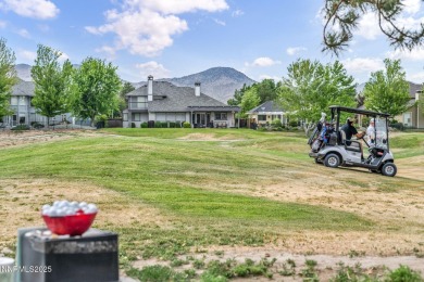 Stunning two-story home situated on the 15th green at Dayton on Dayton Valley Golf Club At Legado in Nevada - for sale on GolfHomes.com, golf home, golf lot