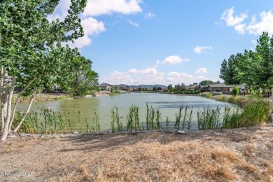 Stunning two-story home situated on the 15th green at Dayton on Dayton Valley Golf Club At Legado in Nevada - for sale on GolfHomes.com, golf home, golf lot