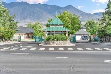 Stunning two-story home situated on the 15th green at Dayton on Dayton Valley Golf Club At Legado in Nevada - for sale on GolfHomes.com, golf home, golf lot
