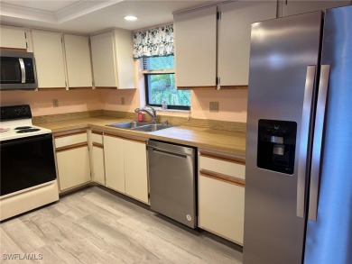 This is a second floor end unit with split bedrooms. Floors are on Copperhead Golf Club in Florida - for sale on GolfHomes.com, golf home, golf lot