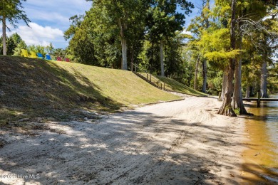 Beautiful pond front homesite in the gated community of Occano on Occano Golf Course in North Carolina - for sale on GolfHomes.com, golf home, golf lot