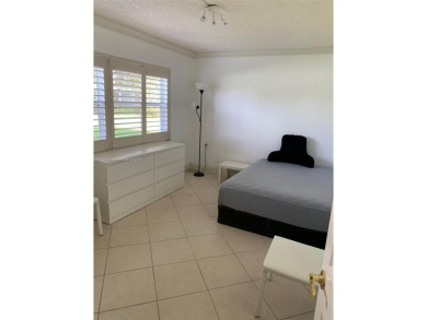 Beautiful first floor end unit. 3 beds, 2 baths with a view to on Wynmoor Golf Course in Florida - for sale on GolfHomes.com, golf home, golf lot