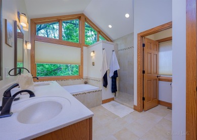 Nestled on a scenic lot in an end of cul-de-sac location, this on Eagle Ridge Inn and Resort in Illinois - for sale on GolfHomes.com, golf home, golf lot