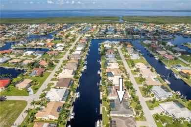 Your dream waterfront retreat awaits in Punta Gorda Isles, where on Saint Andrews South Golf Club in Florida - for sale on GolfHomes.com, golf home, golf lot