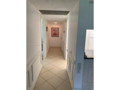 Beautiful first floor end unit. 3 beds, 2 baths with a view to on Wynmoor Golf Course in Florida - for sale on GolfHomes.com, golf home, golf lot