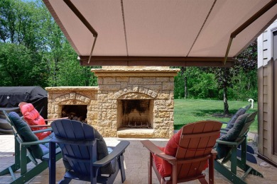 Nestled on a scenic lot in an end of cul-de-sac location, this on Eagle Ridge Inn and Resort in Illinois - for sale on GolfHomes.com, golf home, golf lot