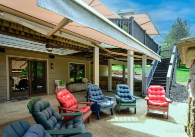 Nestled on a scenic lot in an end of cul-de-sac location, this on Eagle Ridge Inn and Resort in Illinois - for sale on GolfHomes.com, golf home, golf lot