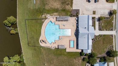 Set your home against peaceful pond views in gated Occano. This on Occano Golf Course in North Carolina - for sale on GolfHomes.com, golf home, golf lot