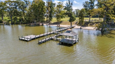 Set your home against peaceful pond views in gated Occano. This on Occano Golf Course in North Carolina - for sale on GolfHomes.com, golf home, golf lot