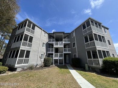 Welcome to this charming 2-bedroom, 2-bathroom coastal condo on Carolina Shores Golf Course in North Carolina - for sale on GolfHomes.com, golf home, golf lot