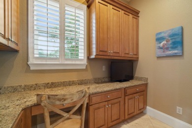 This exquisite custom home, nestled in the secure and golf on Regatta Bay Golf and Country Club in Florida - for sale on GolfHomes.com, golf home, golf lot