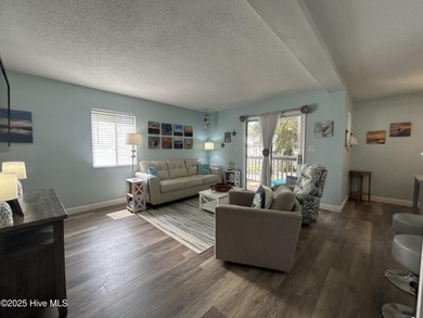 Welcome to this charming 2-bedroom, 2-bathroom coastal condo on Carolina Shores Golf Course in North Carolina - for sale on GolfHomes.com, golf home, golf lot