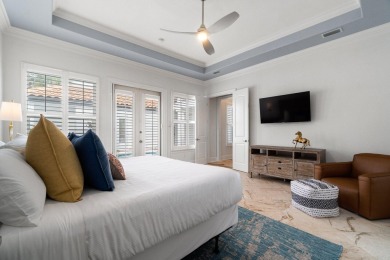 This exquisite custom home, nestled in the secure and golf on Regatta Bay Golf and Country Club in Florida - for sale on GolfHomes.com, golf home, golf lot