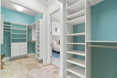 This exquisite custom home, nestled in the secure and golf on Regatta Bay Golf and Country Club in Florida - for sale on GolfHomes.com, golf home, golf lot