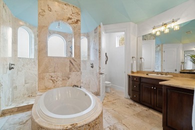 This exquisite custom home, nestled in the secure and golf on Regatta Bay Golf and Country Club in Florida - for sale on GolfHomes.com, golf home, golf lot