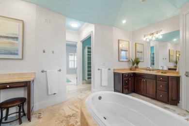 This exquisite custom home, nestled in the secure and golf on Regatta Bay Golf and Country Club in Florida - for sale on GolfHomes.com, golf home, golf lot